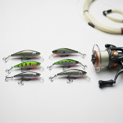 Assortment of saltwater trolling lures and gear